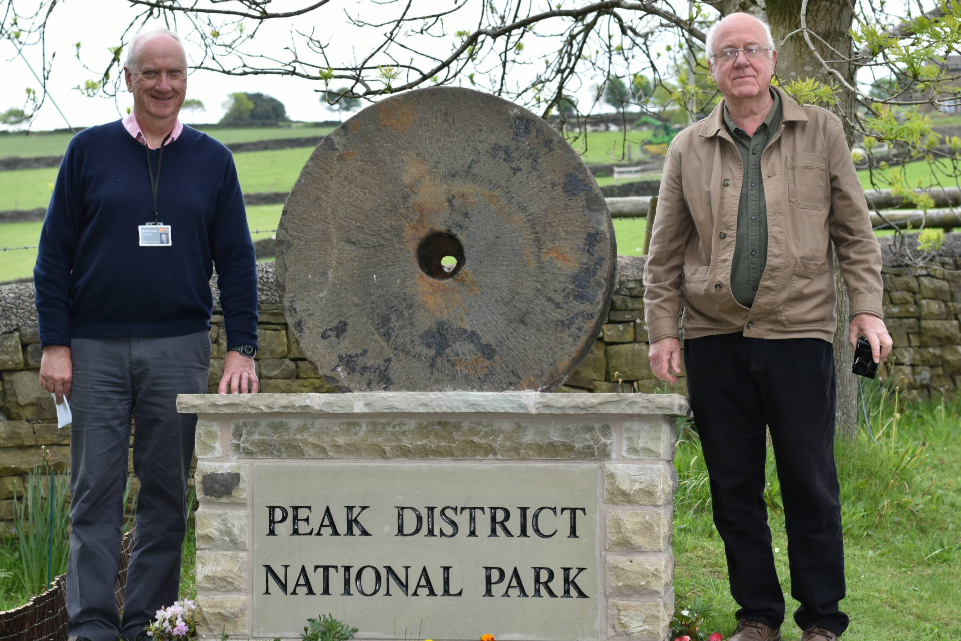 Cllr-Andrew-Gregory-and-Graham-Barrow-with-the-new-boundary-stone
