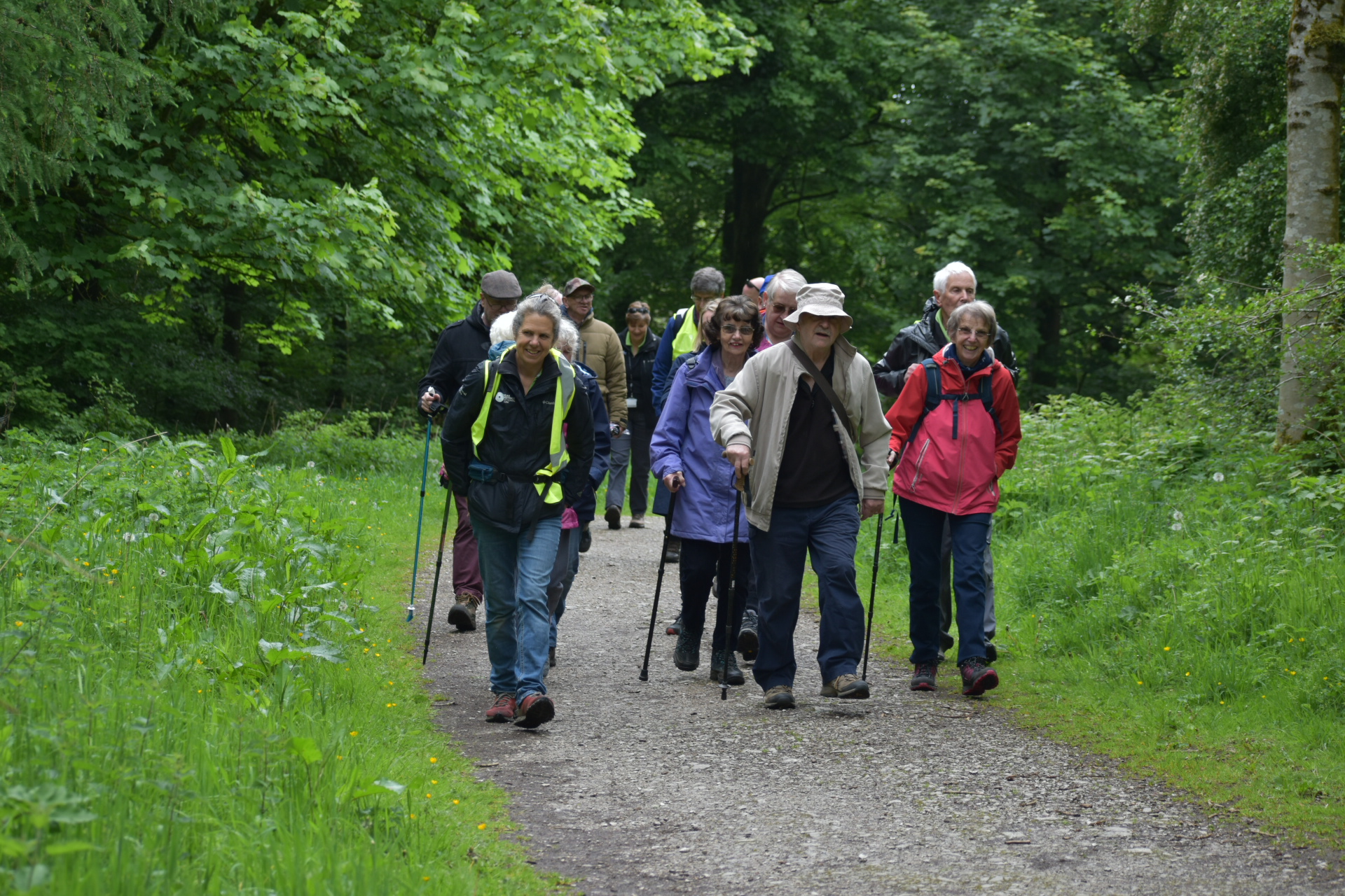 A Peak District National Park Ranger leads a group of people on a health walk